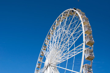 Big wheel against blue sky