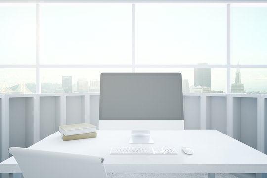 White desktop with computer