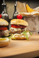 small hamburgers with cherry tomato
