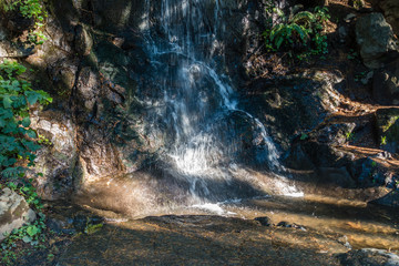 Fototapeta na wymiar Shaded Waterfall 2