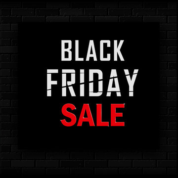 Black Friday sale. Making of the advertising action timed the holiday sales at the end of November. Black Square on a brick wall