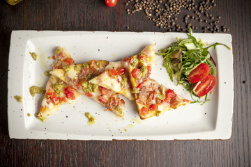 bruschetta with pesto sauce and arugula