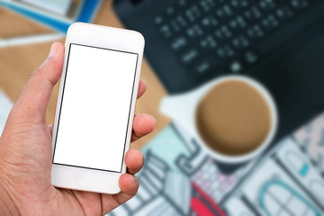 Hand holding mobile smart phone with blank screen in vertical position, blurred background - mockup template