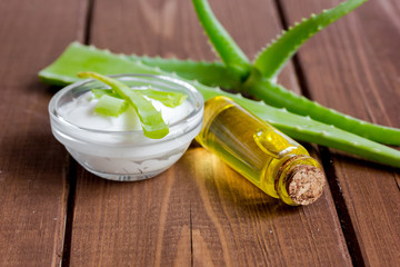 cream with added aloe vera on wooden background macro