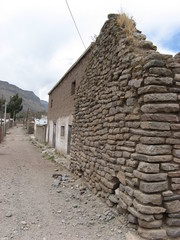 Peru Colca Canyon stone huts along the road