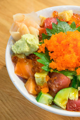 Mixed rice bowl with fresh salmon