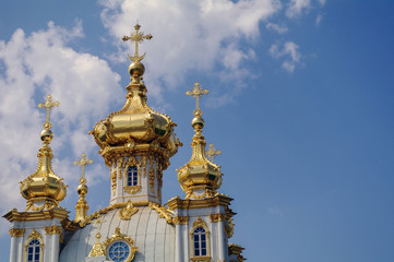 Fototapeta na wymiar PETERHOF, SAINT PETERSBURG, RUSSIA - JUNE 06, 2014: top of tha church. the Upper Park palace was included in the UNESCO World Heritage List