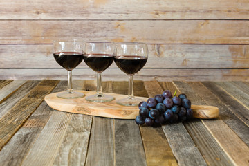 Red wine flight with grapes