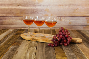 Rose wine flight and grapes