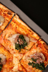 
Pizza on the black background