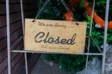 Close-up Retro Wooden Sign "We are Sorry" Closed Please Call me agian Memo to all Customer Remind