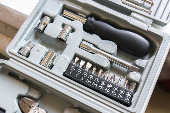 Tool set screwdriver with different nozzles for small bits of the clock mechanisms and telephone equipment for special equipment