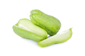 fresh unpeeled chayote on white background
