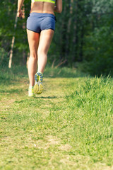 morning jog, girl's legs in sneakers