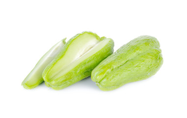 fresh unpeeled chayote on white background