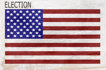 American flag with election message on wood grain texture