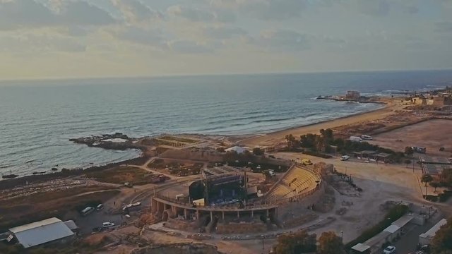 Ancient Caesarea amphitheatre of Romans in Israel aerial video