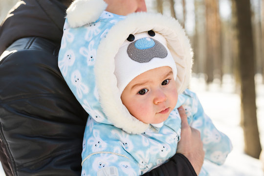 Cute baby at winter background