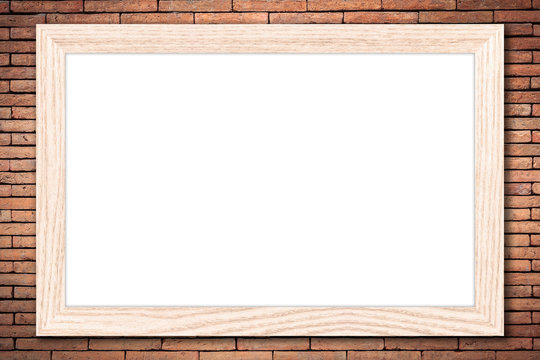 Whiteboard or Empty bulletin board with a wooden frame on brick wall background with copy space for text or image.