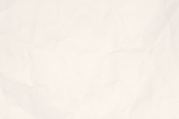 Crumpled light brown paper texture or paper background for design with copy space for text or image.