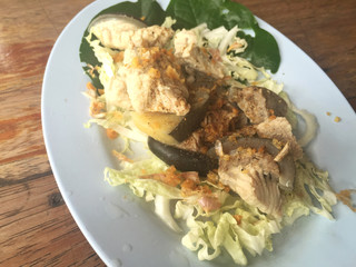 horizontal photo of steamed Mekong giant catfish with vegetables