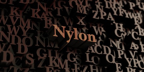 Nylon - Wooden 3D rendered letters/message.  Can be used for an online banner ad or a print postcard.