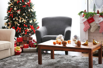 Christmas room with decorated wooden table