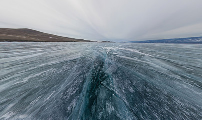 Wide view in motion texture ice lake and a small island