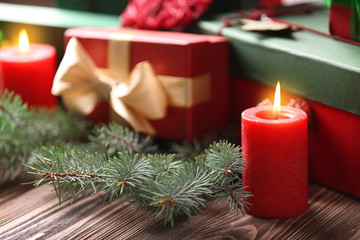 Christmas concept. Gift boxes and decorations on wooden table, closeup