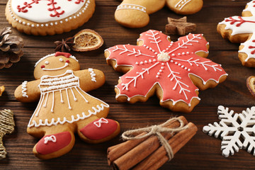 Tasty Christmas tasty cookies on wooden background
