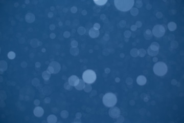 Obraz premium Falling Snow On The Blue Background
