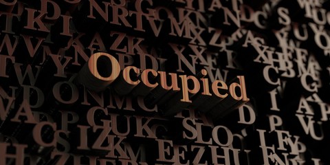 Occupied - Wooden 3D rendered letters/message.  Can be used for an online banner ad or a print postcard.