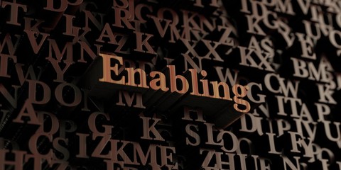 Enabling - Wooden 3D rendered letters/message.  Can be used for an online banner ad or a print postcard.