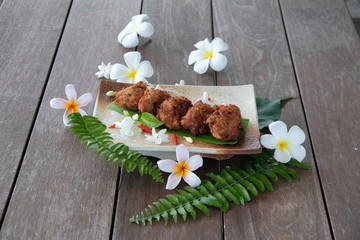 Fried  minced pork  ball on white  plate