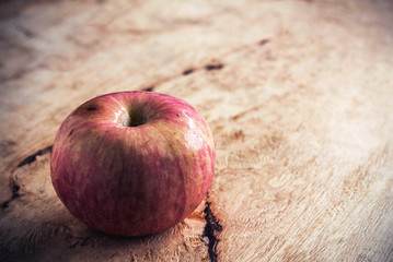 Apple on a wooden