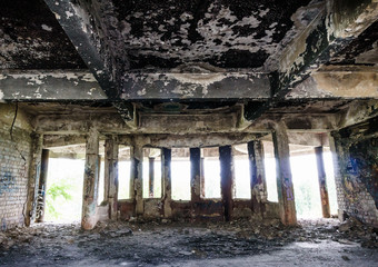 Abandoned burned out building. View from inside, interior