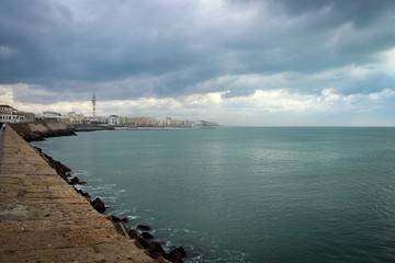 Fototapeta na wymiar Mediterranean Sea embankment in Cadiz, Spain
