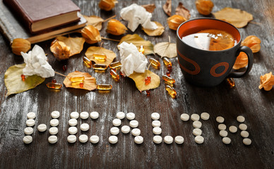 concept health - treatment with hot tea and medecine