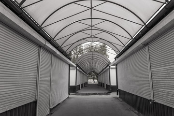 closed shopping arcade. black and white photo