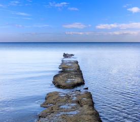 Old dock in the sea