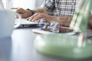 Senior man working on computer