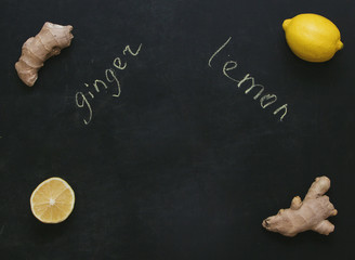  Ginger and lemon as prevention of colds. Dark background. Labels. Copyspace