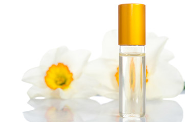 Obraz na płótnie Canvas perfume bottle with flowers isolated on white
