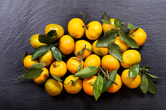 mandarin oranges fruit with leaves
