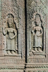 ancient asian stone carved figures in angkor wat temple cambodia