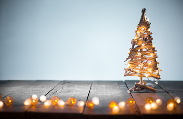 Christmas tree on wooden background