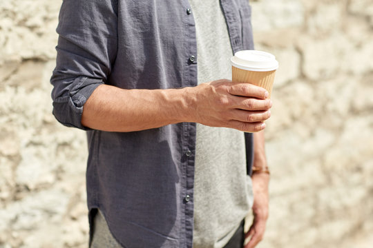 Close Up Of Man With Paper Coffee Cup On Street