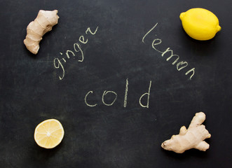  Ginger and lemon as prevention of colds. Dark background. Labels. Copyspace