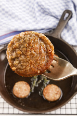 slice of fried white pudding on a fork