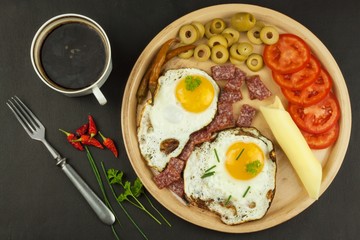 Fried Eggs on a plate. A hearty breakfast for athletes. Healthy food.

